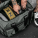 KNKG Plus Duffel: The perfect bag for those seeking durability and style. Robust details and double-stitched seams ensure long-lasting use, while metallic closures add a touch of sophistication. Credit: KNKG Plus
